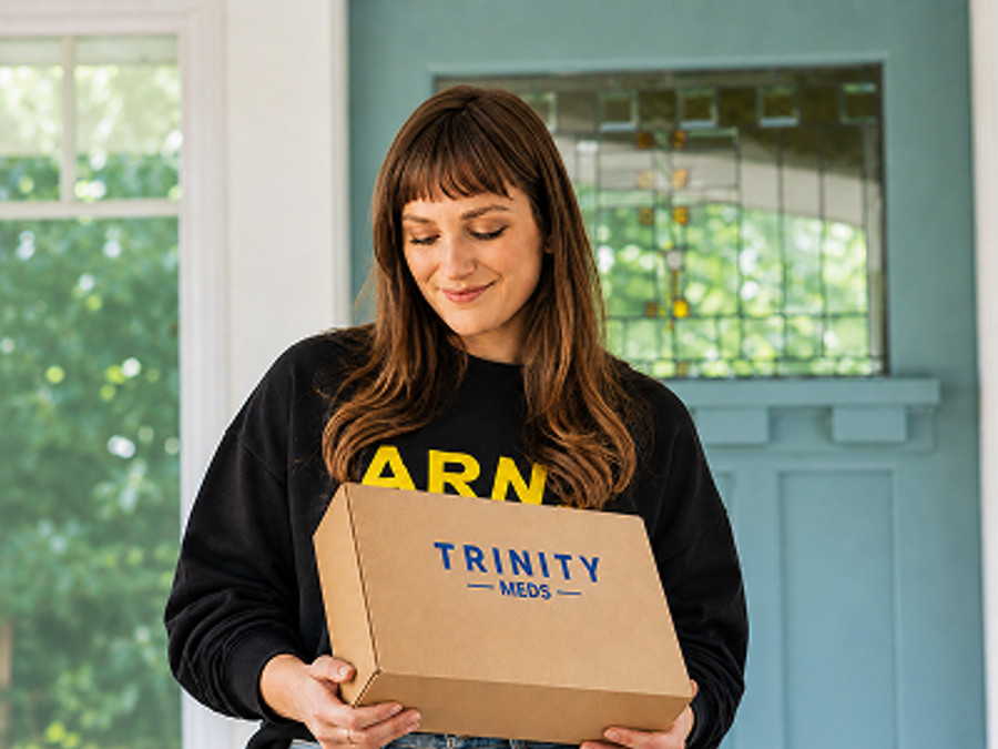 Member receiving a Trinity Meds delivery