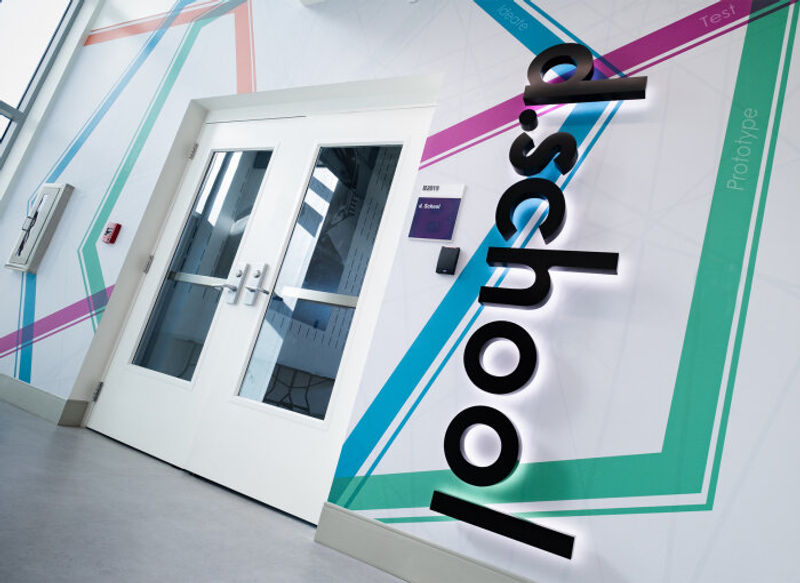 Amplify wall covering with Ethos illuminated dimensional letters