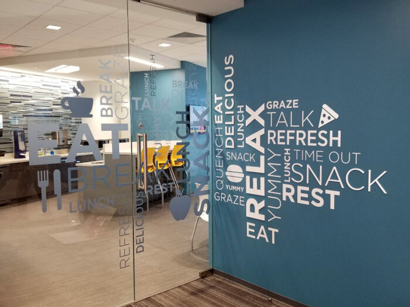 Ethos dimensional Wall graphics & Amplify Window Film (Ghost-deeply frosted option) on a break room glass wall done for Navy Federal Credit Union.
