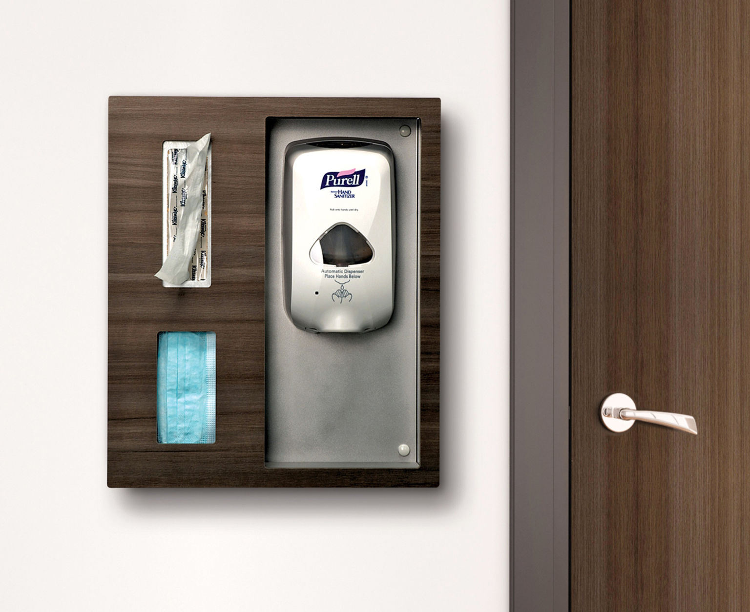 A dark woodgrain sanitizer station design that dispenses masks, tissues, and hand sanitizer adjacent to a door with matching woodgrain.