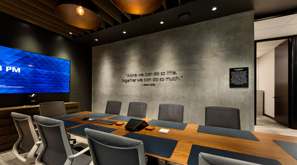 Corporate conference room with inspiuration quote displayed in dimensional lettering.