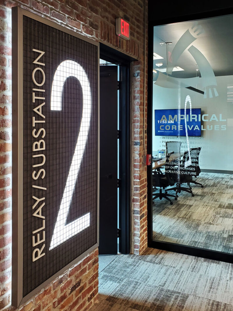 Custom fabricated floor number with face and halo LED illumination & Amplify Clarify Windowfilm