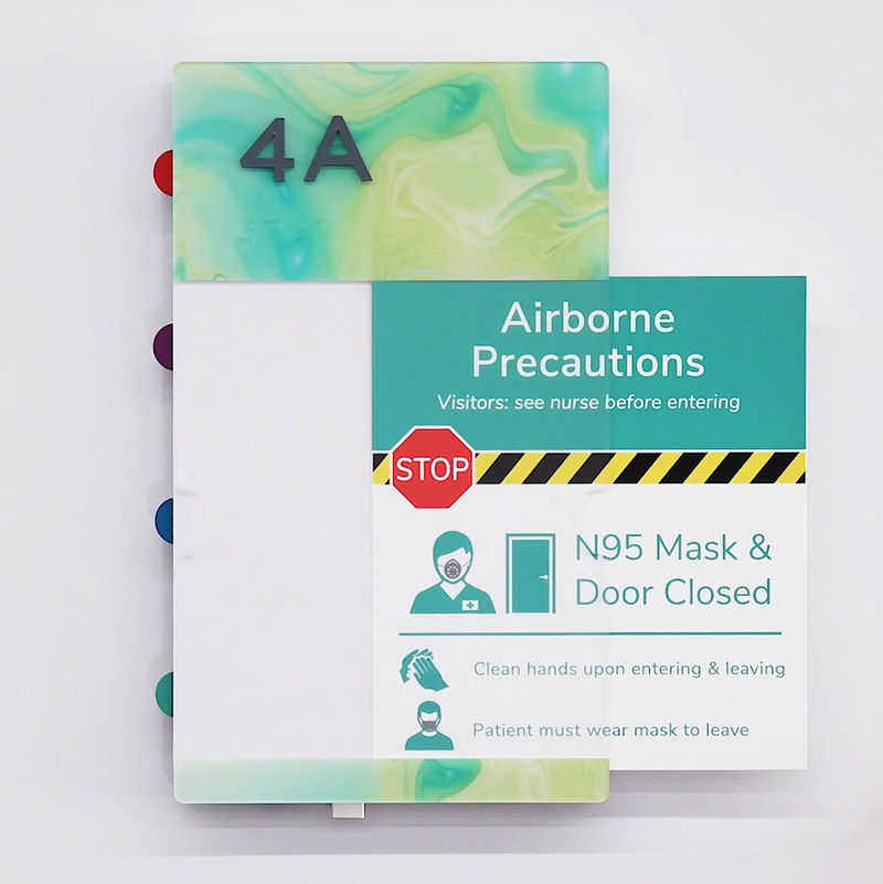 A custom-designed ADA-compliant nurse-alert patient room sign with four alert tabs and one "Airborne precautions" removable insert