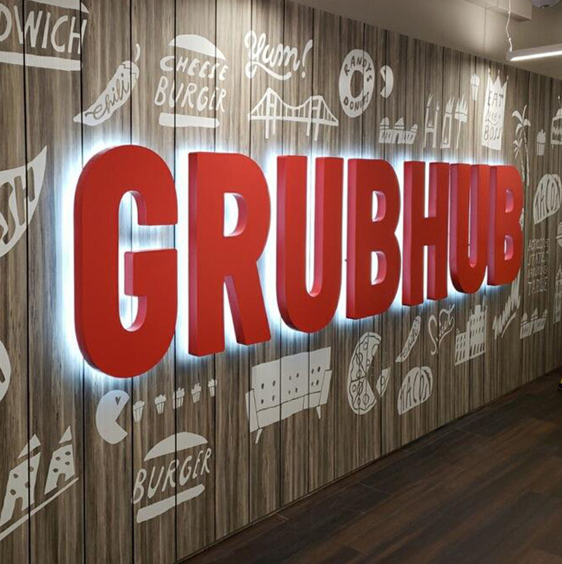 Large interior backlit Ethos dimensional letters installed on a counter for Grubhub food services.