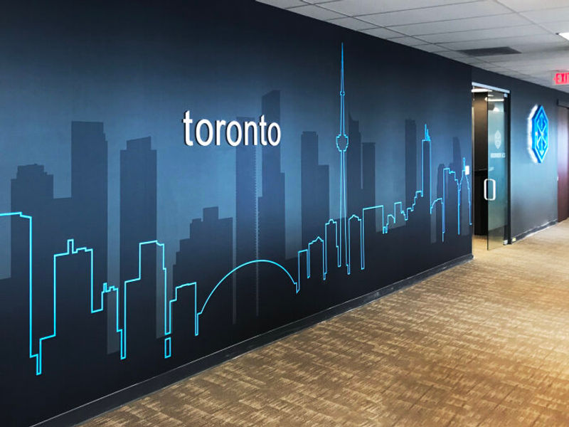 Amplify wallcovering with Ethos dimensional letters & corporate logo