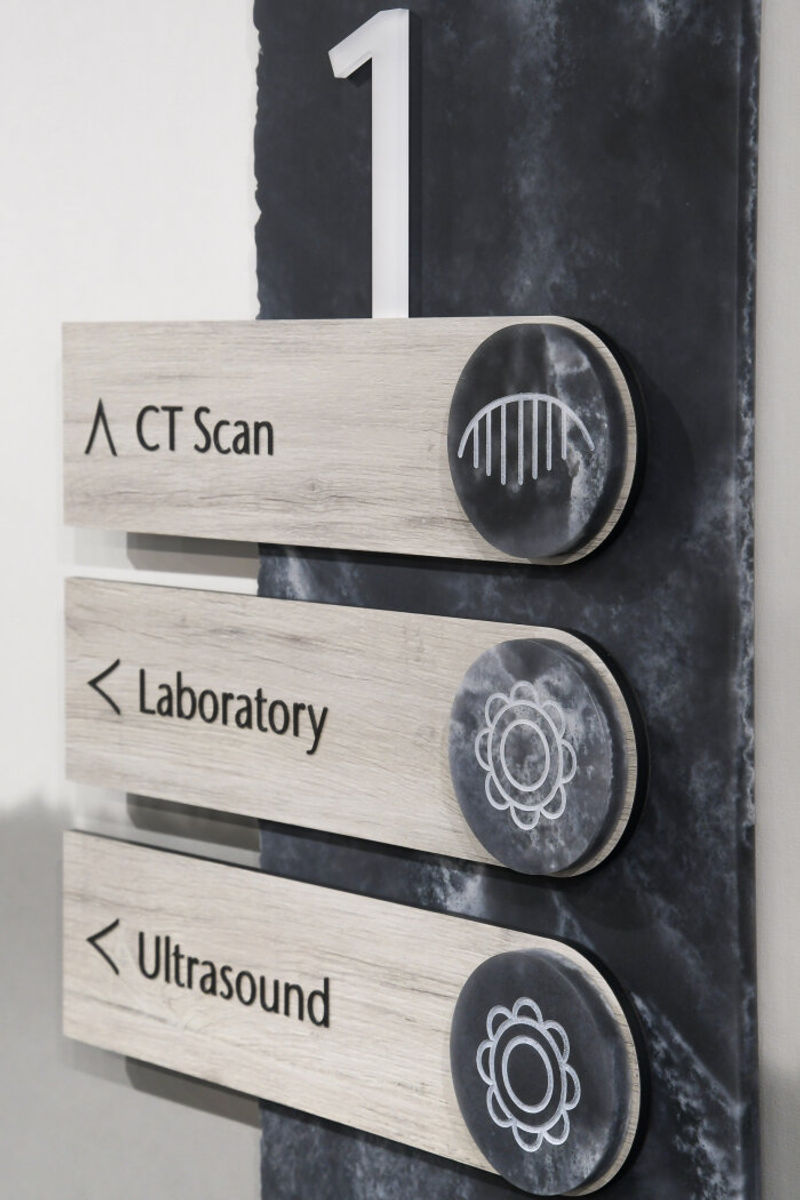 Fusion interior Directory Signage with Wilsonart White Driftwood Laminate and custom backer