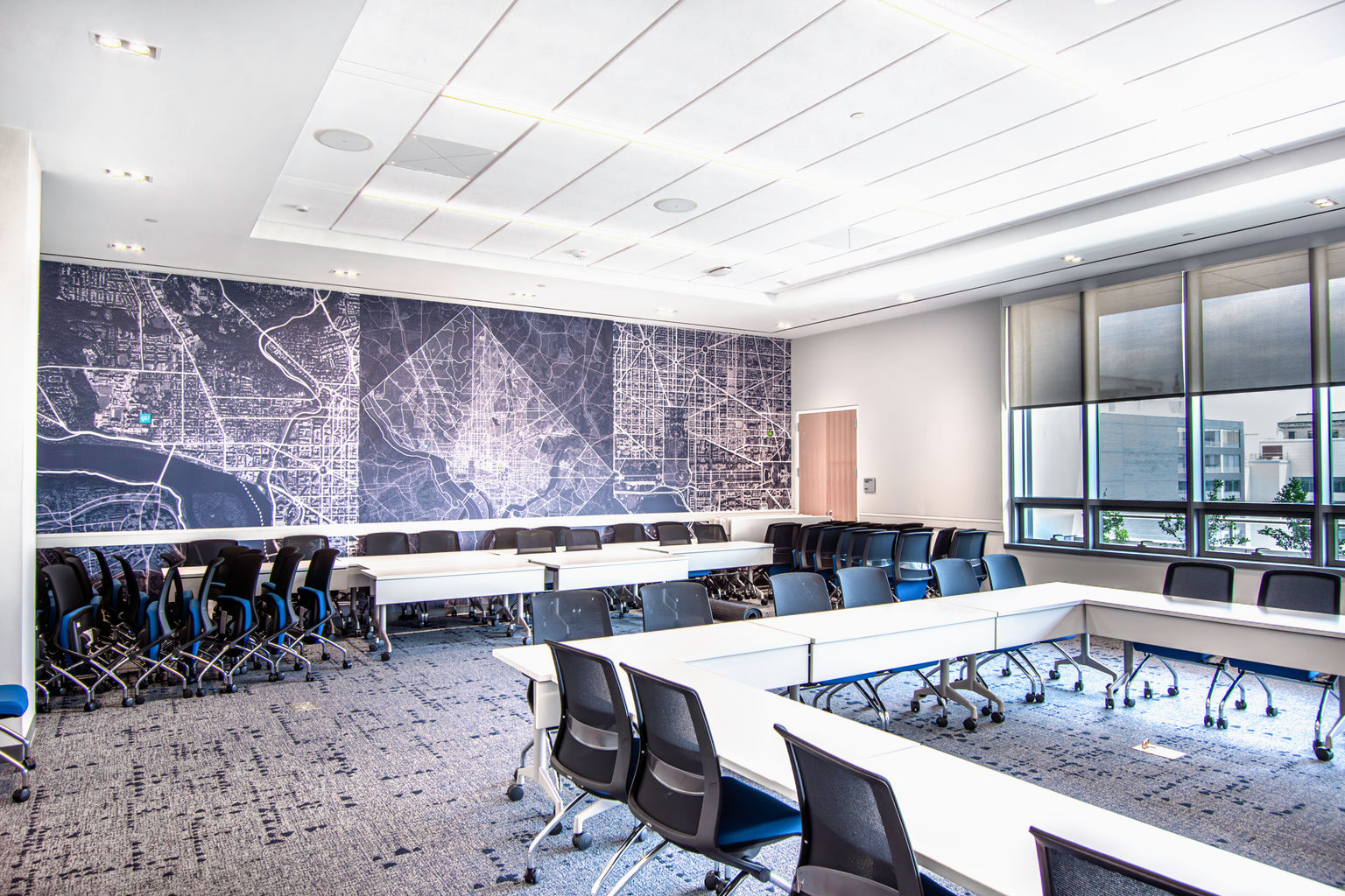 Large wallcovering in a classroom applied to the back wall with direct print aerial schematic map graphic