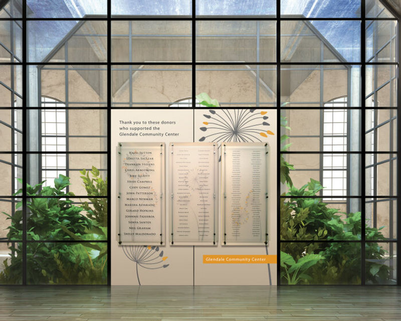 Wilsonart Coconut Oil Solid Surface material behind colorless acrylic panels with second-surface printed graphics and our rod-mount solution to provide dimensionality and elegance to this Applaud Donor Display.