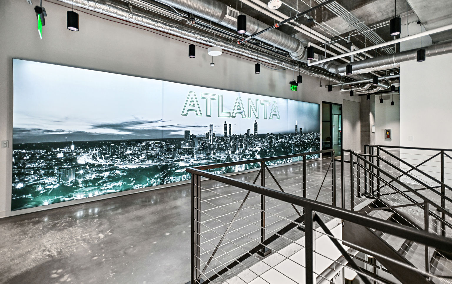 A massive art statement piece of an illuminated silicone edge graphic with a custom printed photo of the Atlanta skyline.