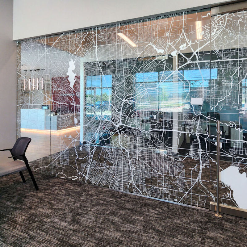 Custom window film on conference room doors.