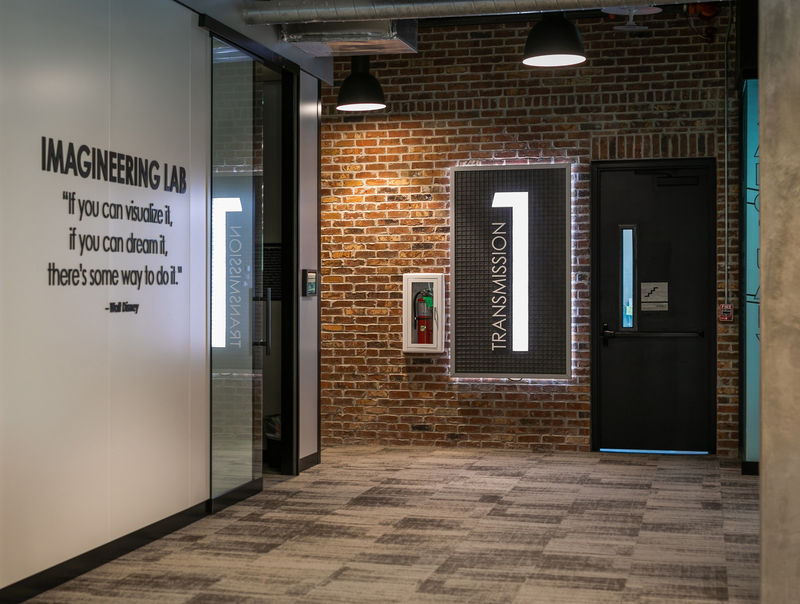 A custom fabricated illuminated level indicator in a corporate headquarters.