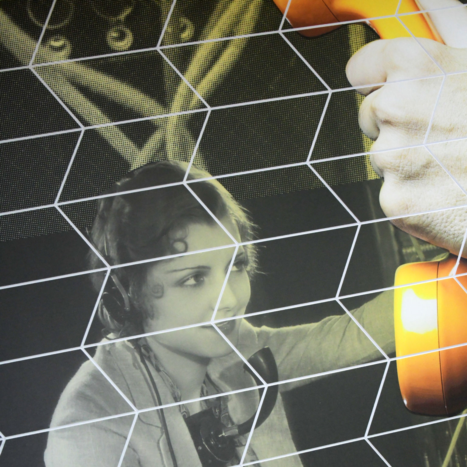 Detail of acoustic tile installation with a custom printed design featuring retro photos of a switchboard operator and phone