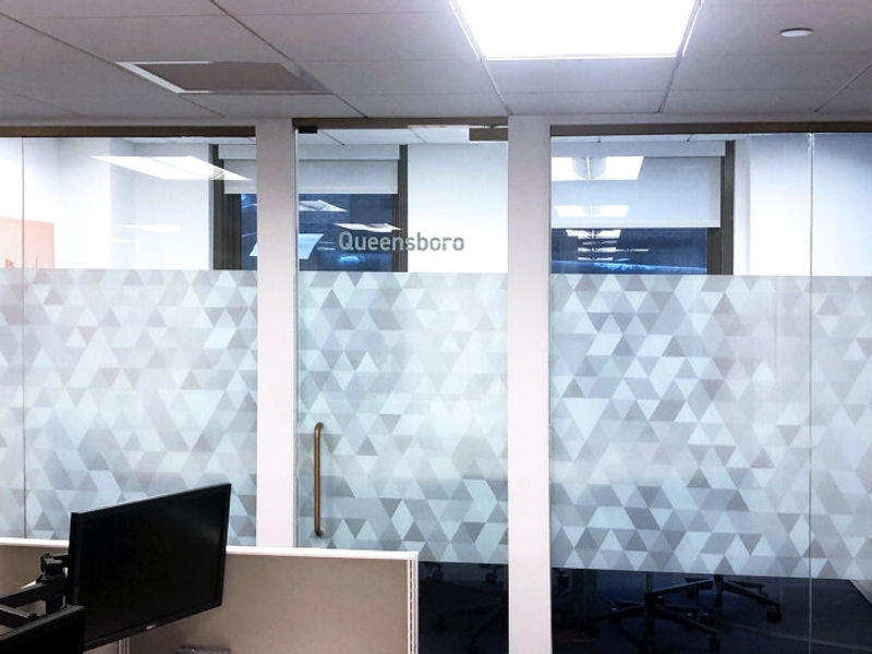 Amplify Lucid clear Windowfilm with white ink printed graphic privacy band in a Corporate Office