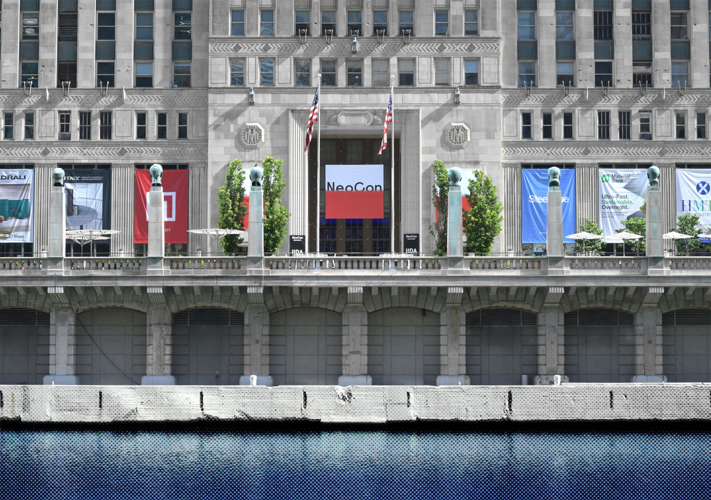 A photo of the facade of the merchandise mart located in downtown Chicago.