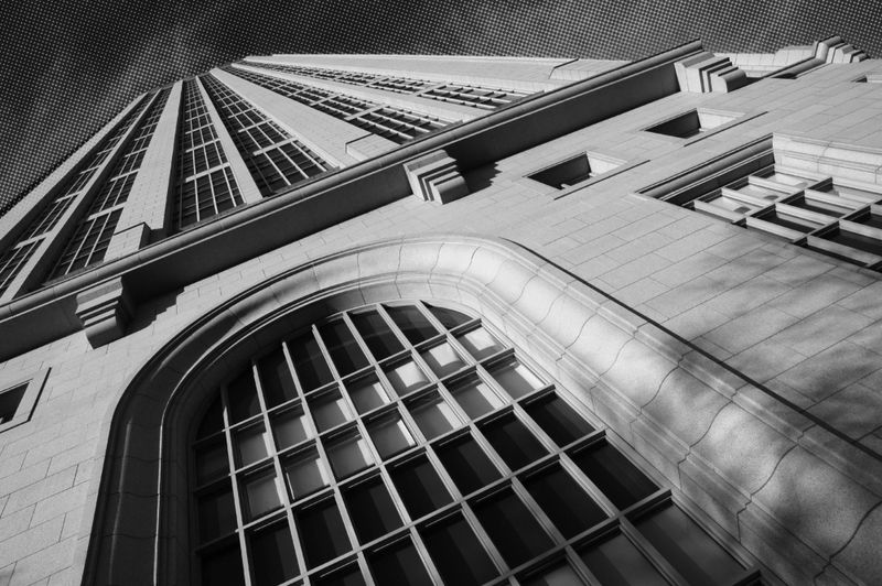 Black and white photo of downtown Atlanta architecture with a halftone graphic applied.