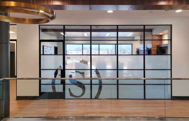 Amplify window film on office windows with company logo.