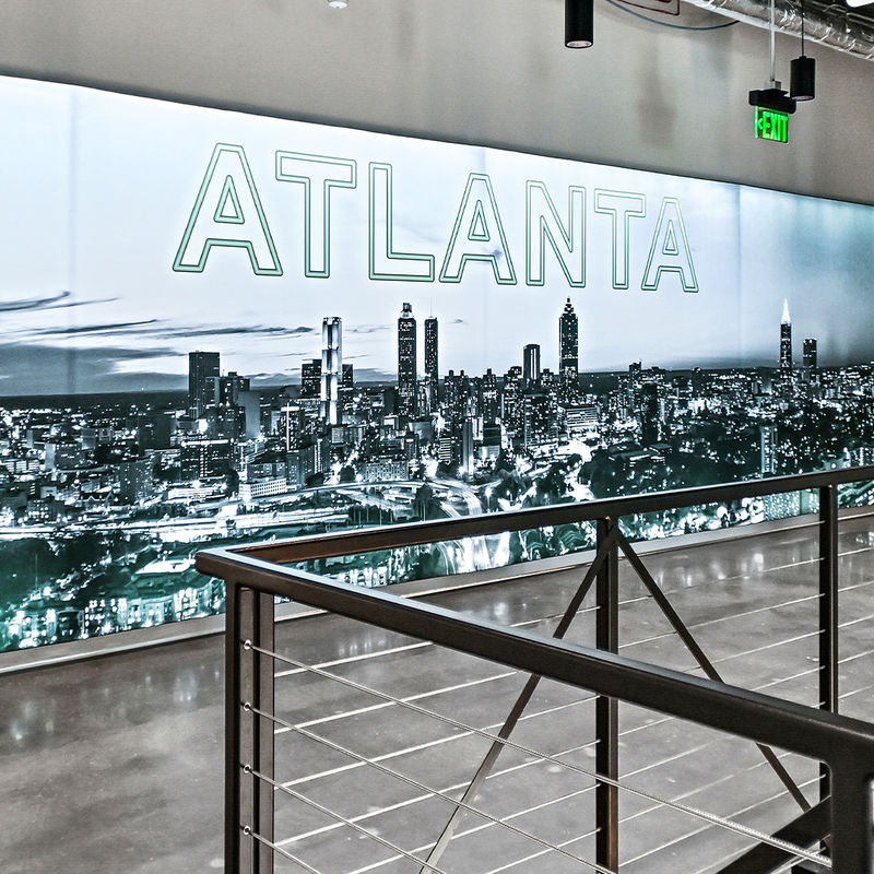 A massive art statement piece of an illuminated silicone edge graphic with a custom printed photo of the Atlanta skyline.
