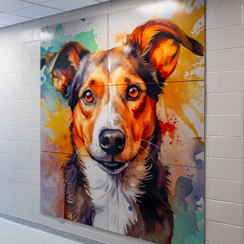 An art installation of a colorful watercolor puppy illustration on graphic panels in a pet resource center.