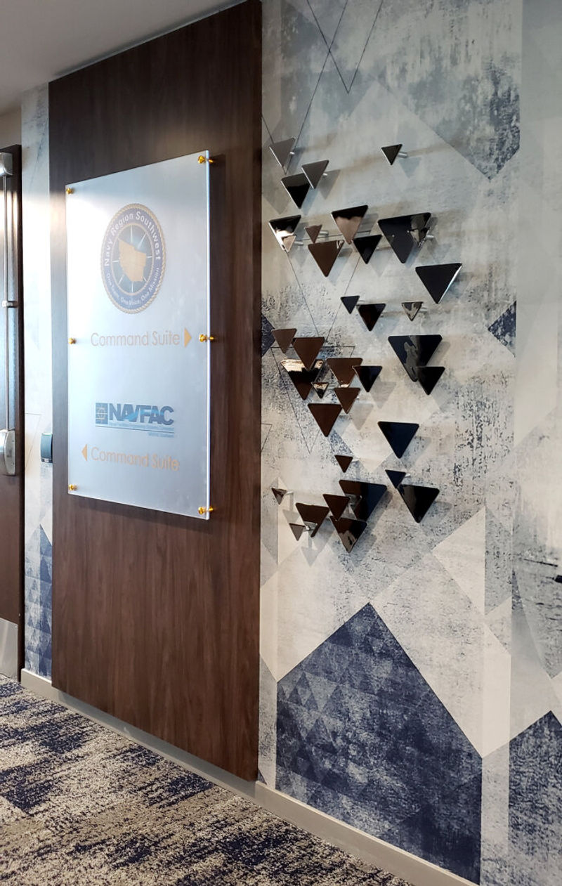Custom Wall Directory including Amplify Pebble Wallcovering & Wilsonart Wood Laminate Wall Panel Feature