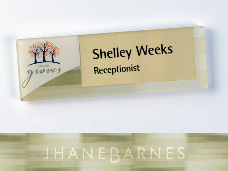 Direct print workstation nameplate with changeable paper insert using Jhane Barnes Nuance Sand pattern done for a Senior Living facility