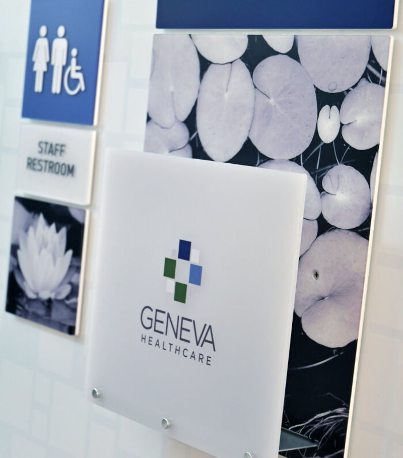 Vivid interior signage family paired with a direct-print nest wall organizer unit.