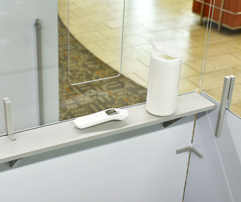 The Return Temperature Check Station kits protect screeners and incoming staff/visitors with a comprehensive set of product and signage. Stations include a screening pass-through window and a built-in five-inch utility shelf that keeps equipment readily a
