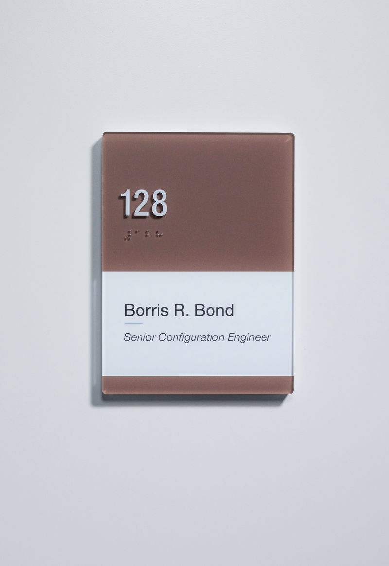 Interior room ID signage with changeable insert