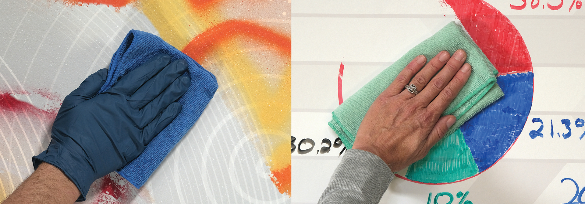 Close-up photo of gloved hand cleaning graffiti from custom-printed wallcovering. Close-up photo of hand erasing dry-erase marker form custom-printed wallcovering.