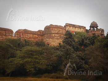 Purana Qila and lake outside it