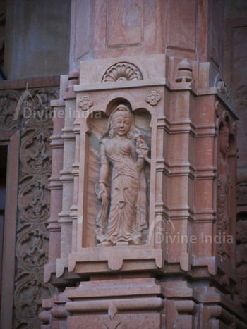 Lady sculpture on the temple wall