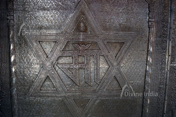 Devi Chandi Devi Jaya and Devi Vijaya emboss picture at Chinpturni temple entrance gate