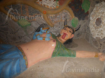 Putna Vadh Sculpture at Moksha Dham Temple