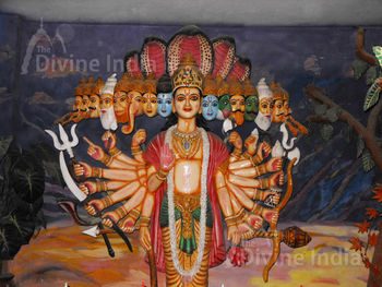 Vishnu Virat Roop Sculpture at Moksha Dham Temple