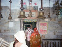 Bells at the entry door of the Yogamaya temple