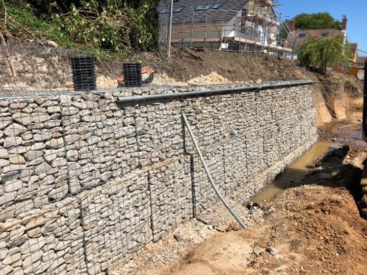  Gabions with hand stacked “dry stone wall” finish