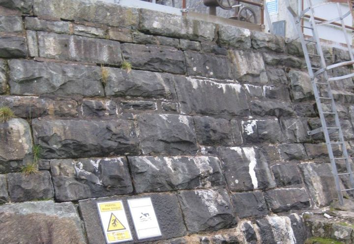 Downstream face of the dam to be supported by the proposed berm