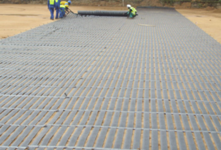 A compacted layer of decomposed granite was placed on top of the geotextile foll