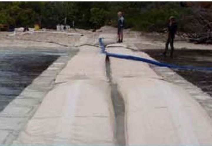 Installation of top row of MacBags on groin
