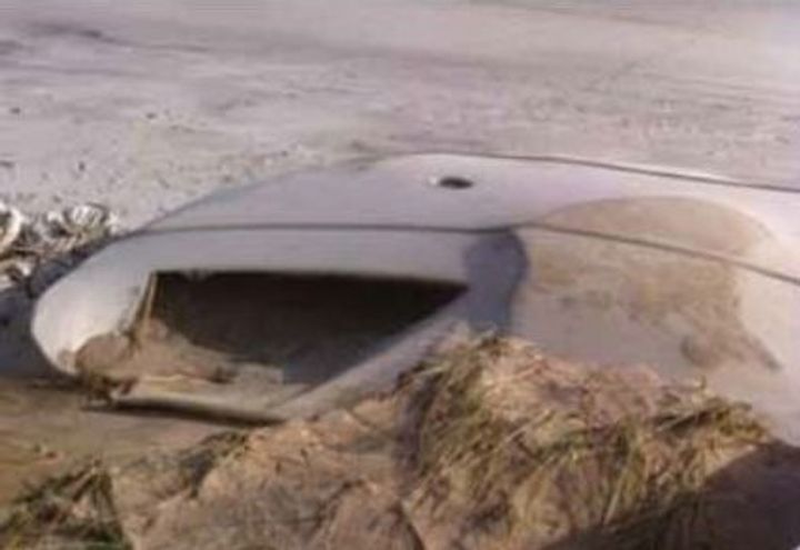 Small rips caused by debris were filled with sand and patches