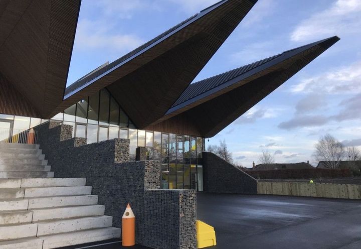 Gabion cladding around doors and windows