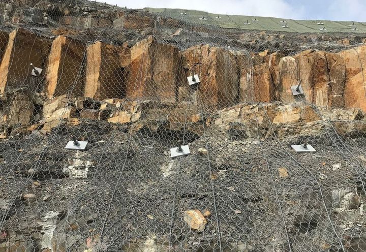 Steelgrid HR draped over the rock face