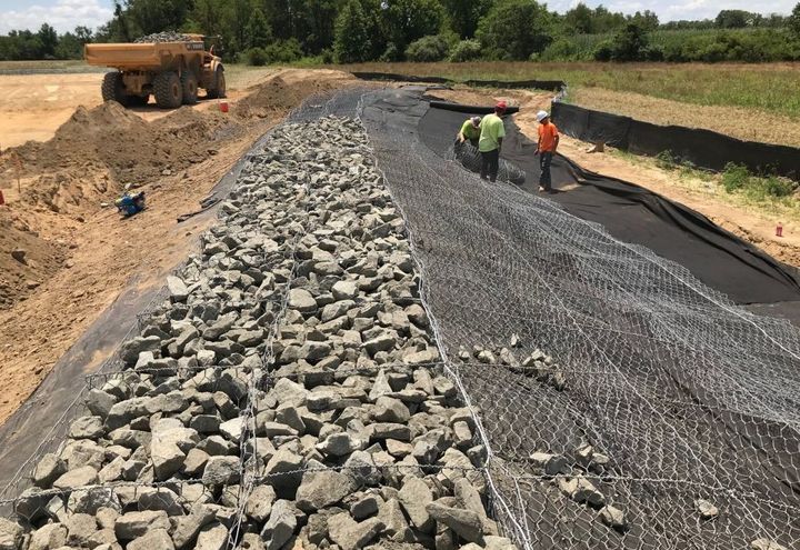 Gabion Mats being rolled out and filled
