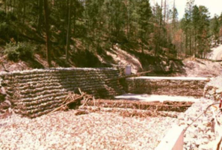 Gabion and Gabion mat® revetment, and debris basin