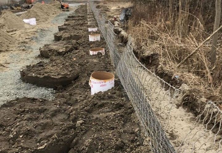 Sonotubes embedded in the wall for guardrail installation