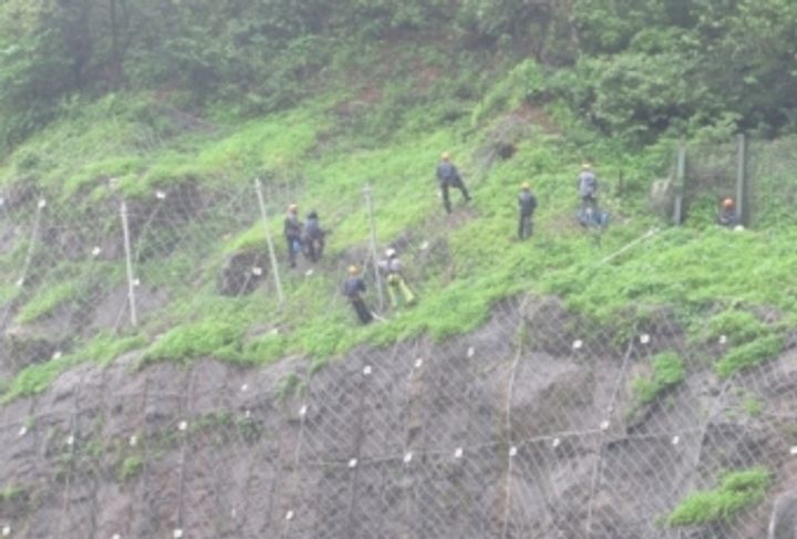 Photo 5: Rockfall mitigation measures at Adoshi tunnel- Dynamic Rockfall Barrier
