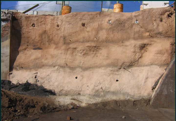 Finished soil-nailed and shotcreted face