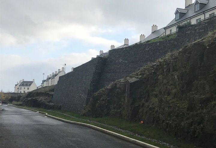 View of the gabion structure successfully integrated and surrounding rockface