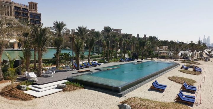 Distant view of completed pool constructed above buried protection structures