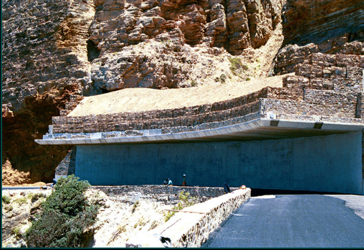 Cantilever structure with gabion impact barrier