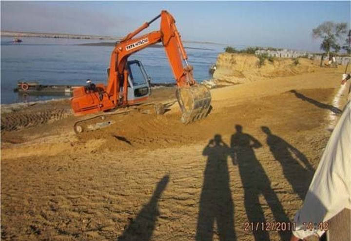 Photo 2: Dressing of slope during construction